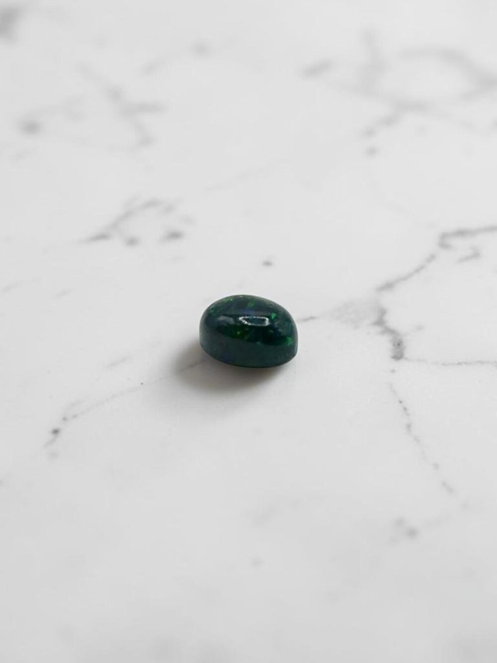 0.74 Carat Oval Cabochon Black Ethiopian Opal Gemstone